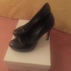 Calvin Klein black patent leather platform pumps
