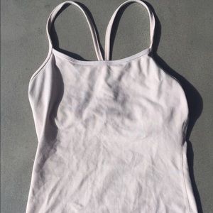 Size 4 light pink tank with shelf bra