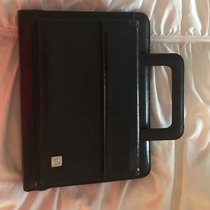 Organizer and planner with handle