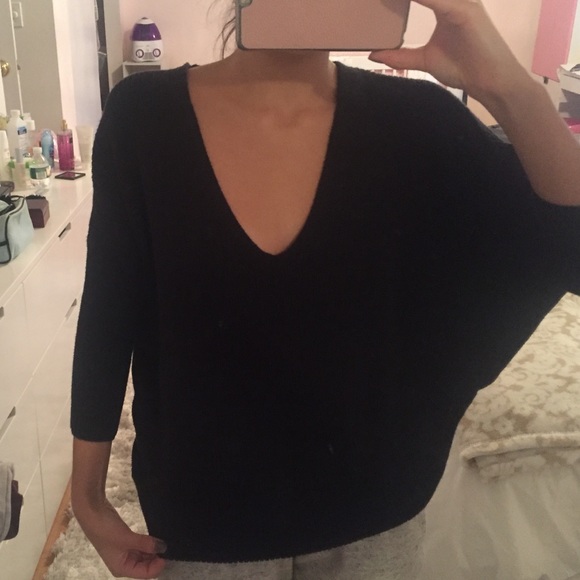 Black low neck knit top
