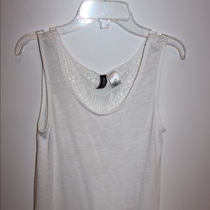 Sleeveless white shirt