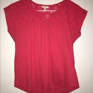 Red cotton blouse.