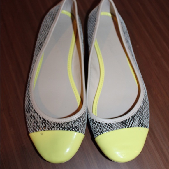 Snakeskin and yellow ballet flats