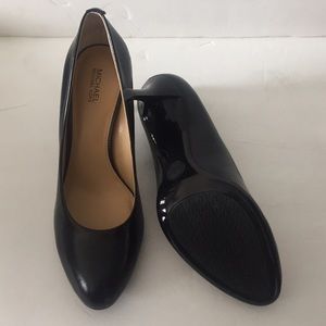 New black leather Michael Kors heels