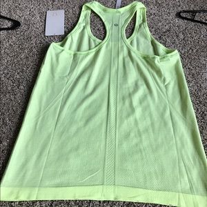 NWT swiftly racer back size 10