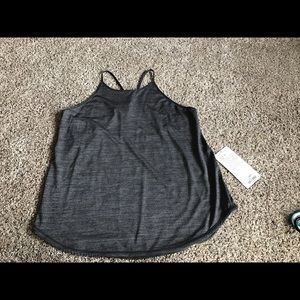 NWT fast as light singlet