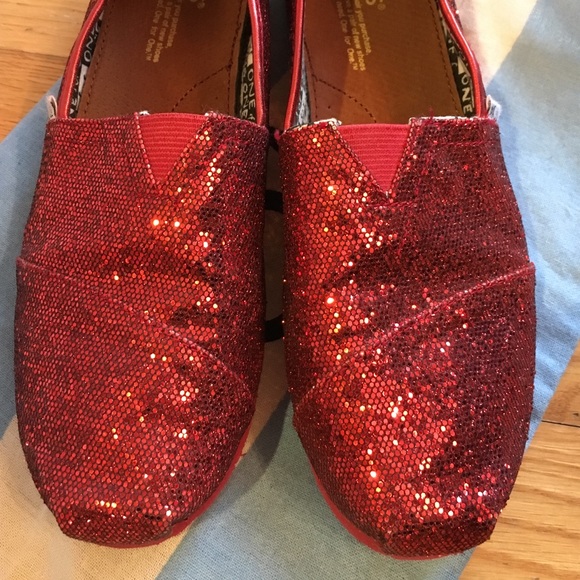 Red glitter girls slip on Toms