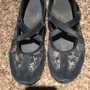 Skechers black slip on shoes