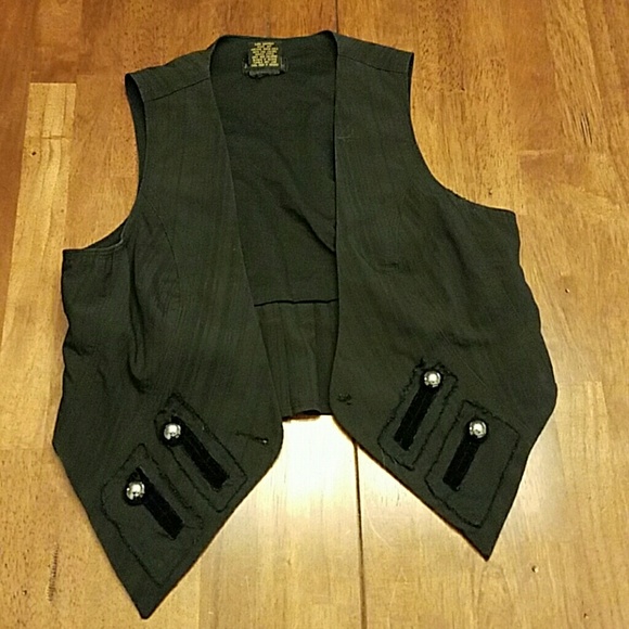 Black vest. Cute to layer or accessorize