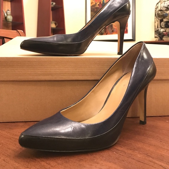 Ann Taylor navy and black leather pumps.