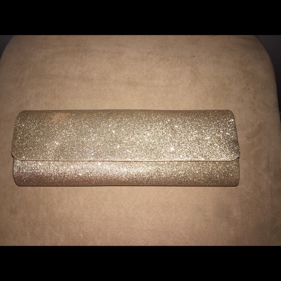 Used tan sparkly clutch