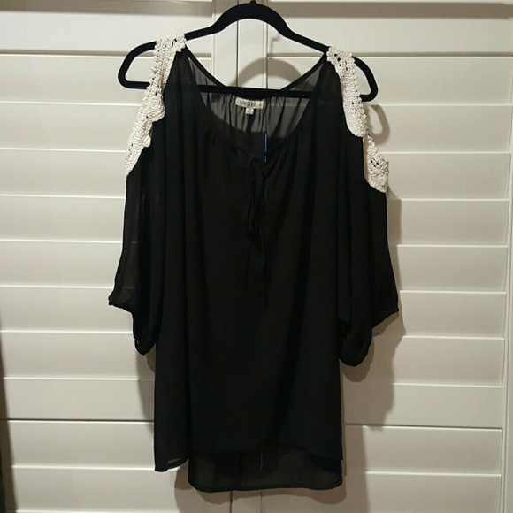 Open shouldered black blouse with knit embellishme