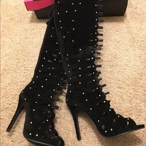 Black studded calf high boots.  Brand new