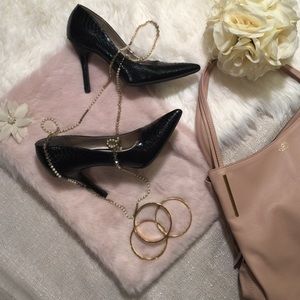 Black snakeskin heels