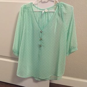 Sea green blouse.