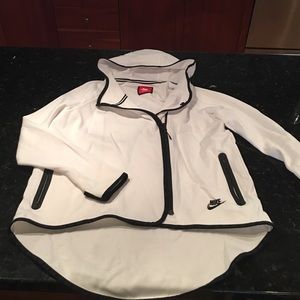 White Nike hoodie with black trim.