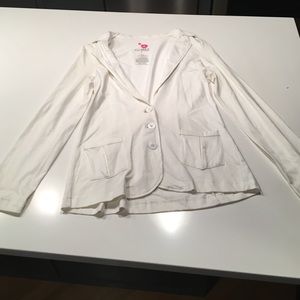 Miley Cyrus Max Azria white cotton blazer.