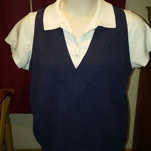 Short sleeve shirt with attached sweater vest.