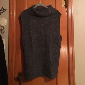 Gray sweater vest.