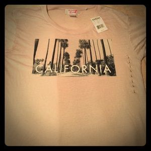 Two never worn blouses.