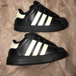 Black & White Adidas size 5K shell top sneakers