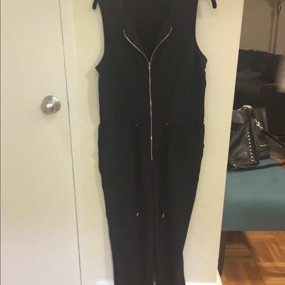 Black jumpsuit with zipper and tie waist