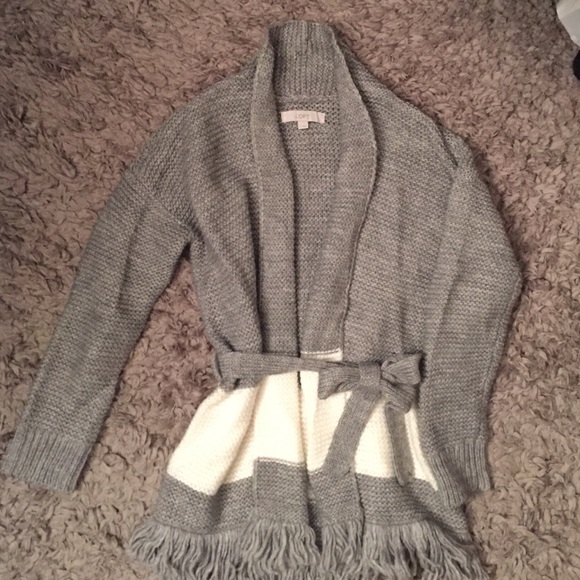 Cozy gray sweater with white stripe.