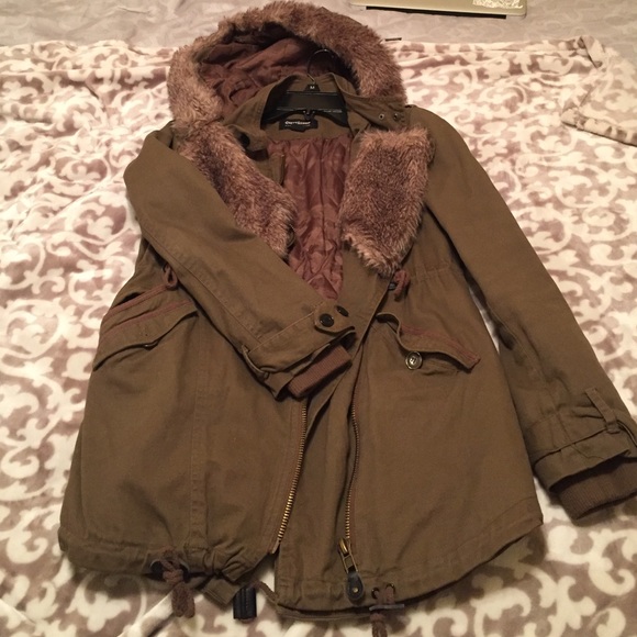 Green parka with fur accents