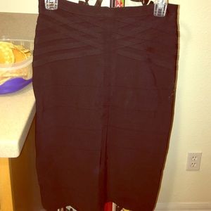 Black right midi skirt by BEBE.