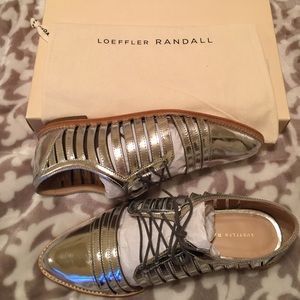 Metalic cut out loafers