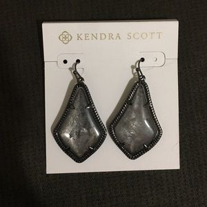 Kendra Scott earrings.