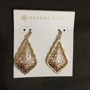 Kendra Scott earrings.