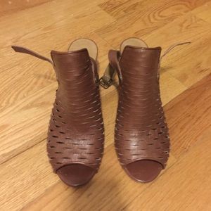 Perforated mules with back straps