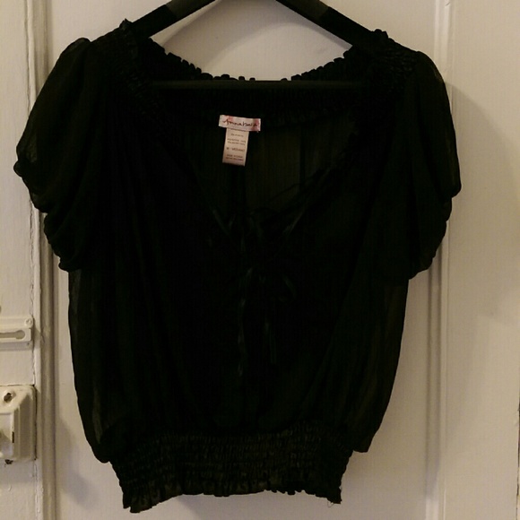 Sheer black blouse