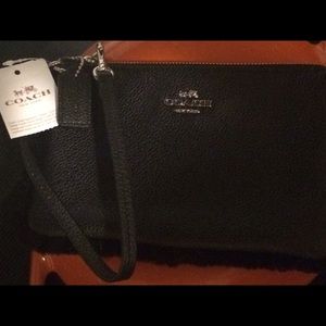 NWT Coach faux fur black pebbled leather wristlet