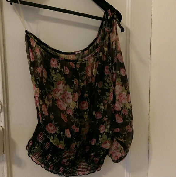 Black and flowery sheer top.