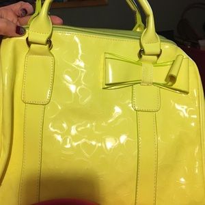 Neon yellow handbag with hearts