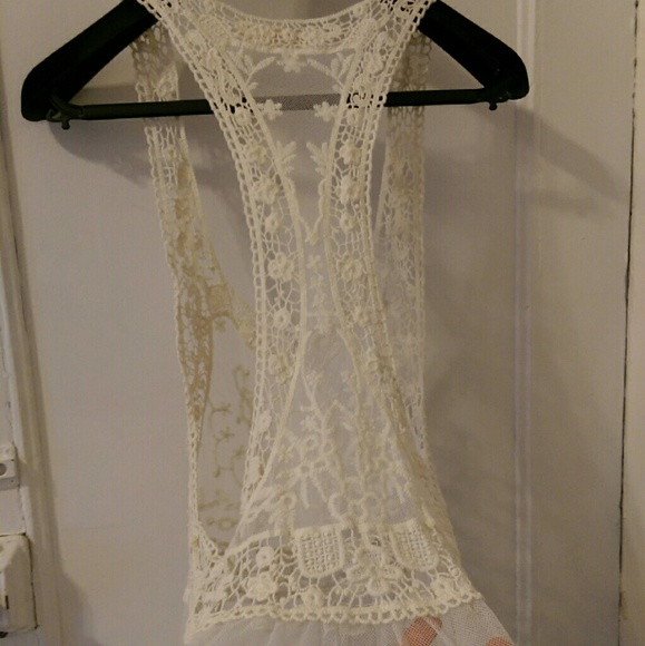 Ivory sheer top.
