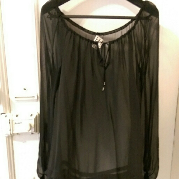 Sheer black blouse.