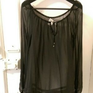 Sheer black blouse.