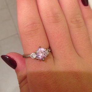 Purple and silver diamond ring