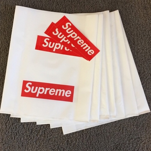 3 supreme bags and 4 supreme bogo stickers.