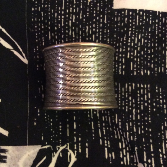 Silver wrist cuff bracelet.