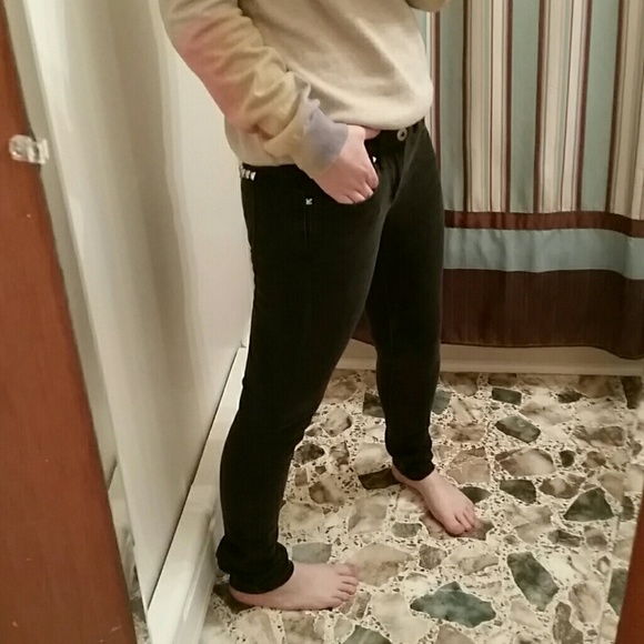 Studded black skinnies