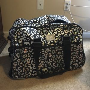Victoria secret rolling duffle bag