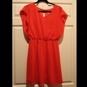 Red-orange dress with subtle open back