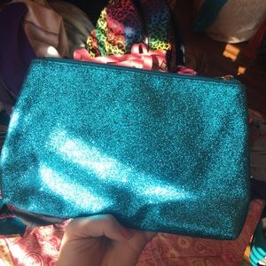 Bath and Body Works blue glittery make up bag