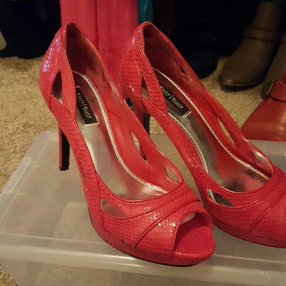 Red snakeskin peep toes