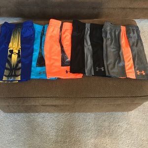 Five pairs of youth S Under Armour shorts