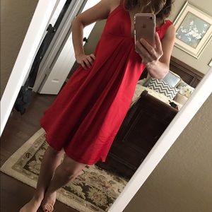 Red Calvin Klein satin cocktail dress.